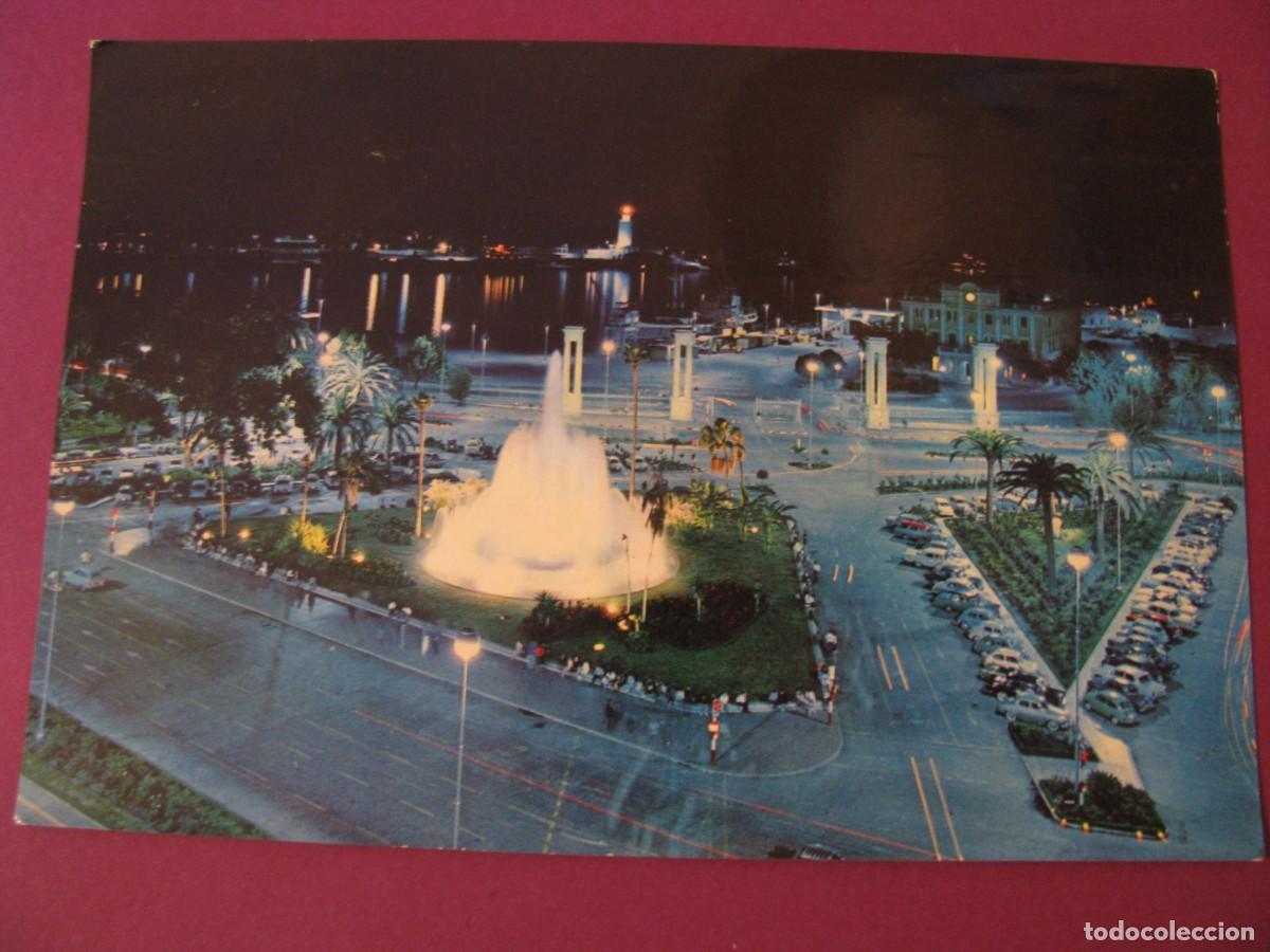 Cartes Postales: POSTAL DE MALAGA. FUENTE DE LA MARINA Y PUERTO, DE NOCHE. BEASCOA 1013. ESCRITA 1965
