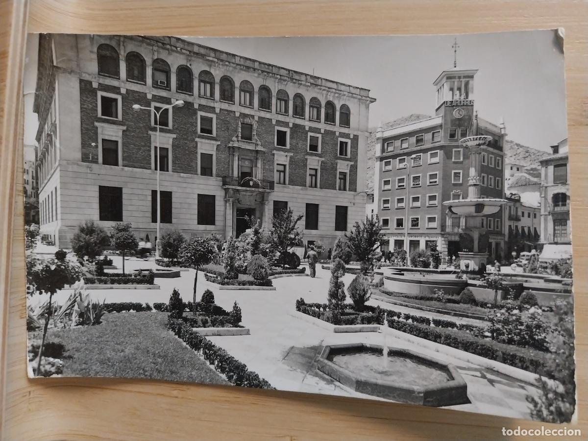 Postales: JAEN PLAZA JOSE ANTONIO ED SICILIA 12 CIRCULADA ANIMADA CAJA AHORROS PARQUE RELOJ EDIFICIO