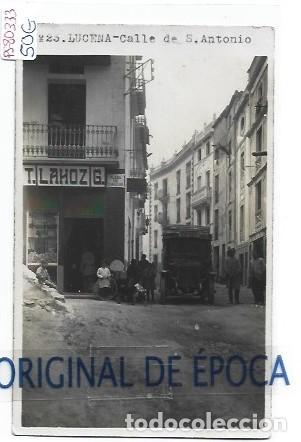 Postales: (PS-80333)POSTAL FOTOGRAFICA DE LUCENA(CORDOBA)-PLAZA DE CANALEJAS.TIENDA DE T.LAHOZ G.VIVERES Y TAB