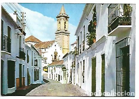 Postales: CALLE DE SEVILLA E IGLESIA DE NTRA. SRA. DE LOS REMEDIOS.- ESTEPONA / MALAGA