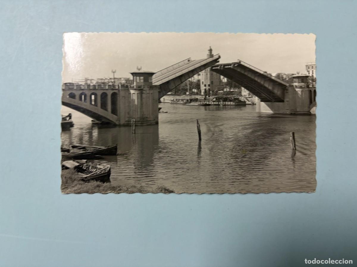 Postales: TARJETA POSTAL FOTOGR&Aacute;FICA. SEVILLA. 63.- PUENTE DE SAN TELMO Y TORRE DEL ORO. ED. GARCIA GARRABELLA