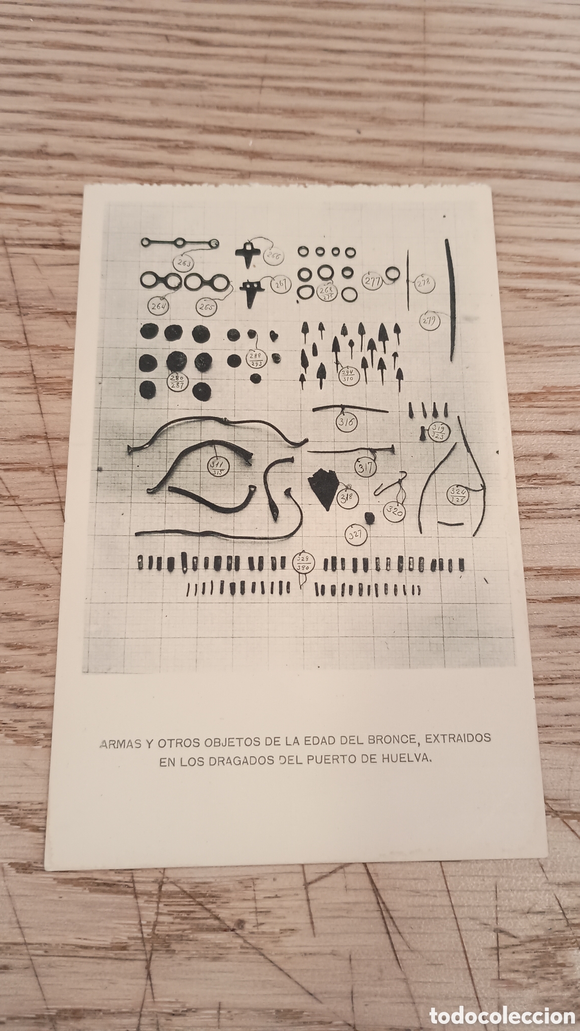 Postales: ARMAS Y OTROS OBJETOS DE LA EDAD DEL BRONCE, EXTRA&Iacute;DOS EN LOS DRAGADOS DEL PUERTO DE HUELVA
