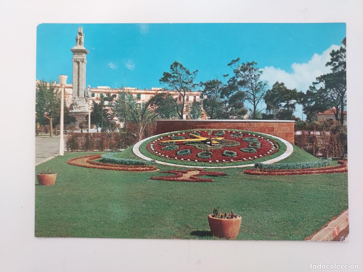 Postales: POSTAL CADIZ PLAZA DE ESPA&Ntilde;A. 1963. ESCRITA. RELOJ JARDIN