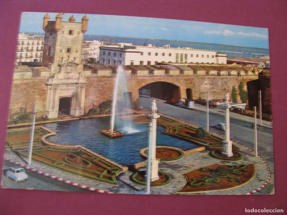 Postales: POSTAL DE CADIZ. PUERTA DE TIERRA. Y MONUMENTO A SAN SERVANDO Y SAN GERMAN. RO FOTO. ESCRITA