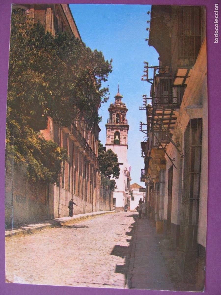 Postales: POSTAL DE SANLUCAR DE BARRAMEDA. CALLE CABALLERO, PARROQUIA DE NTRA. SRA. DE LA O. LIBRERIA LUENGO