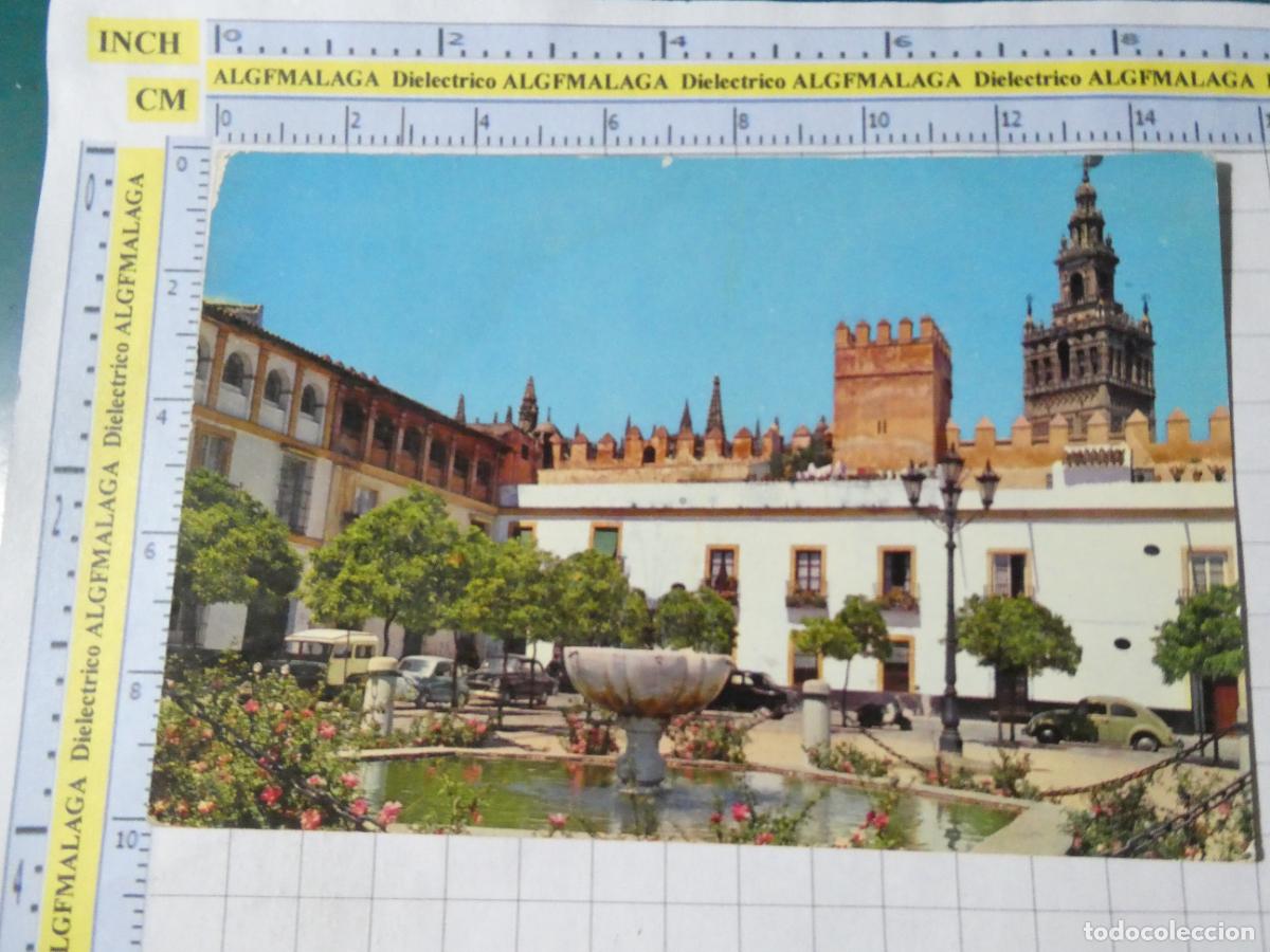Postales: POSTAL DE SEVILLA. A&Ntilde;O 1964. PATIO BANDERAS ALC&Aacute;ZAR GIRALDA. 132 RO FOTO. COCHES. 466