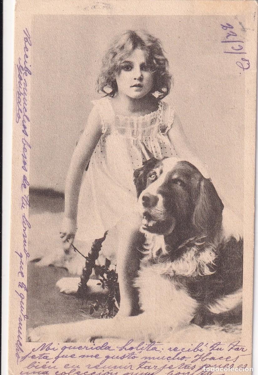Postales: Postal ni&ntilde;a con perro. Reverso sin dividir. circulada, sello desprendido.