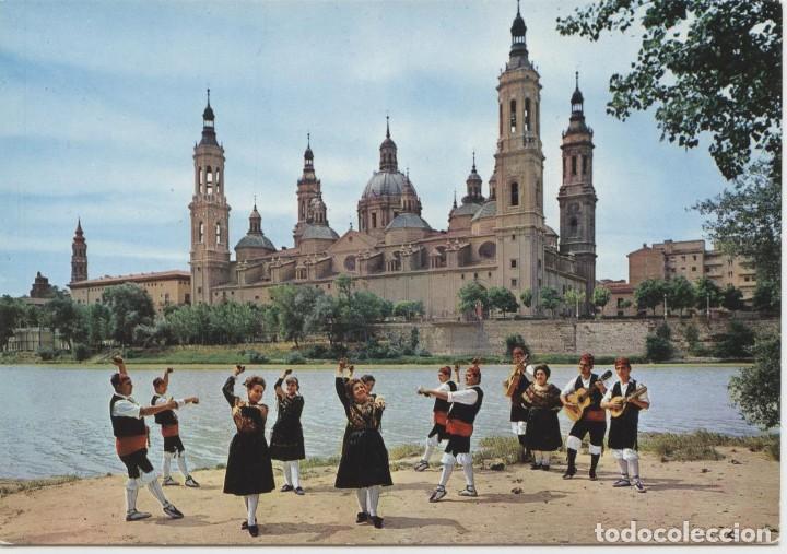 Postales: N&ordm; 75-ZARAGOZA. Grupo regional, Bas&iacute;lica al fondo. Escrita en 1965. Ed. COMERCIAL JOSAN