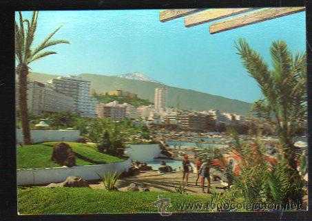 Cartes Postales: TARJETA POSTAL DE PUERTO DE LA CRUZ - VISTA PARCIAL DE LA CIUDAD DESDE EL LAGO MARTIANEZ. PU 137