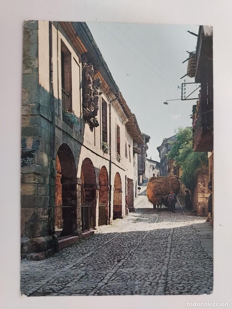 Cartes Postales: POSTAL SANTILLANA DEL MAR CALLE TIPICA. CARRO. 1964. CIRCULADA. CANTABRIA