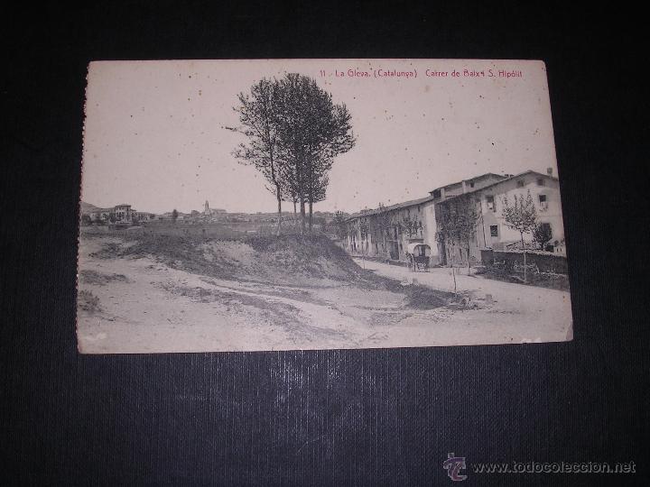 Postkarten: 11 - LA GLEVA ( CATALUNYA )CARRER DE BAIX I S. HIPOLIT .ANGEL TOLDRA VIAZO . 14X9 CM.