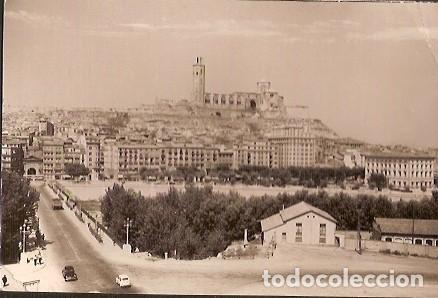 Postales: ANTIGUA POSTAL 16 LERIDA VISTA PARCIAL Y LA SEO ANTIGUA CATEDRAL ESCRITA 1964 GARCIA GARRABELLA
