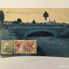 Postales: AMPOSTA (TARRAGONA) POSTAL PUENTE DE PIEDRA SOBRE EL CANAL DE RIEGO. ROISIN (A.1947) CÍRCULADA
