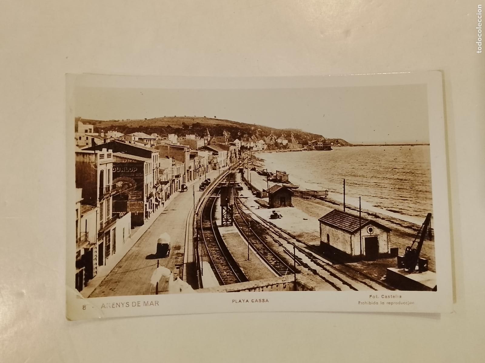 Postales: ARENYS DE MAR -PLAYA CASSA-FERROCARRIL-CARTEL DUNLOP- FOTOGRAFICA CASTELLS -POSTAL ANTIGUA-(115.276)