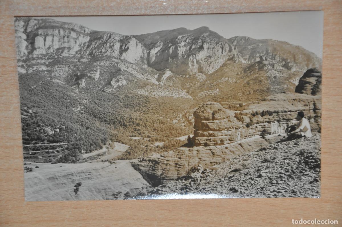 Postales: postal peramola, roca llarga al fons aubens