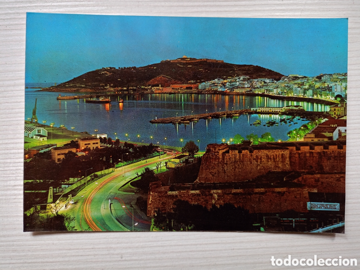Postales: CEUTA, NOCTURNA DESDE LA AV.DE AFRICA - EDIT. LIB.GENERAL N&ordm;34 - EDITADA EN 1965 - S/C