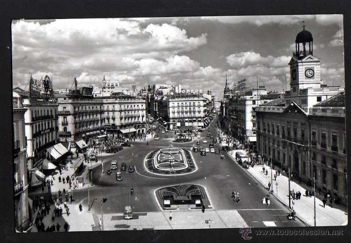 Postales: Madrid Puerta del Sol. Circulada . - Foto 1