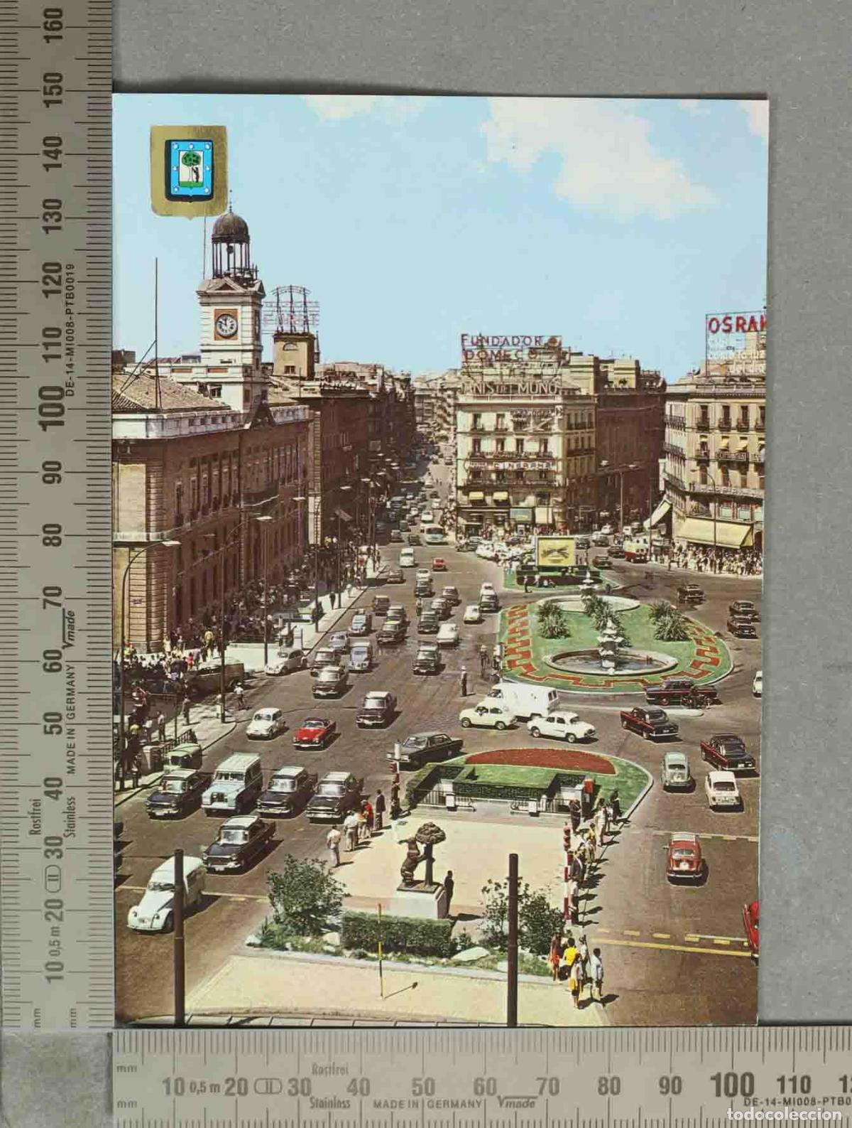 Postales: POSTAL. Madrid - Puerta del Sol - Vista a&eacute;rea con la Real Casa de Correos y tr&aacute;fico
