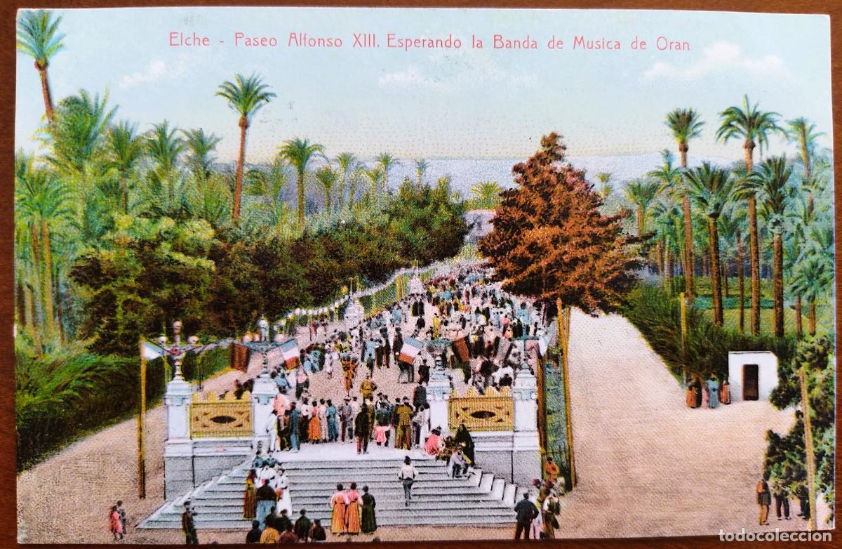 Postales: ELCHE. PASEO ALFONSO XIII. ESPERANDO LA BANDA DE M&Uacute;SICA DE OR&Aacute;N - LAMPISTER&Iacute;A ANT&Oacute;N, ELCHE