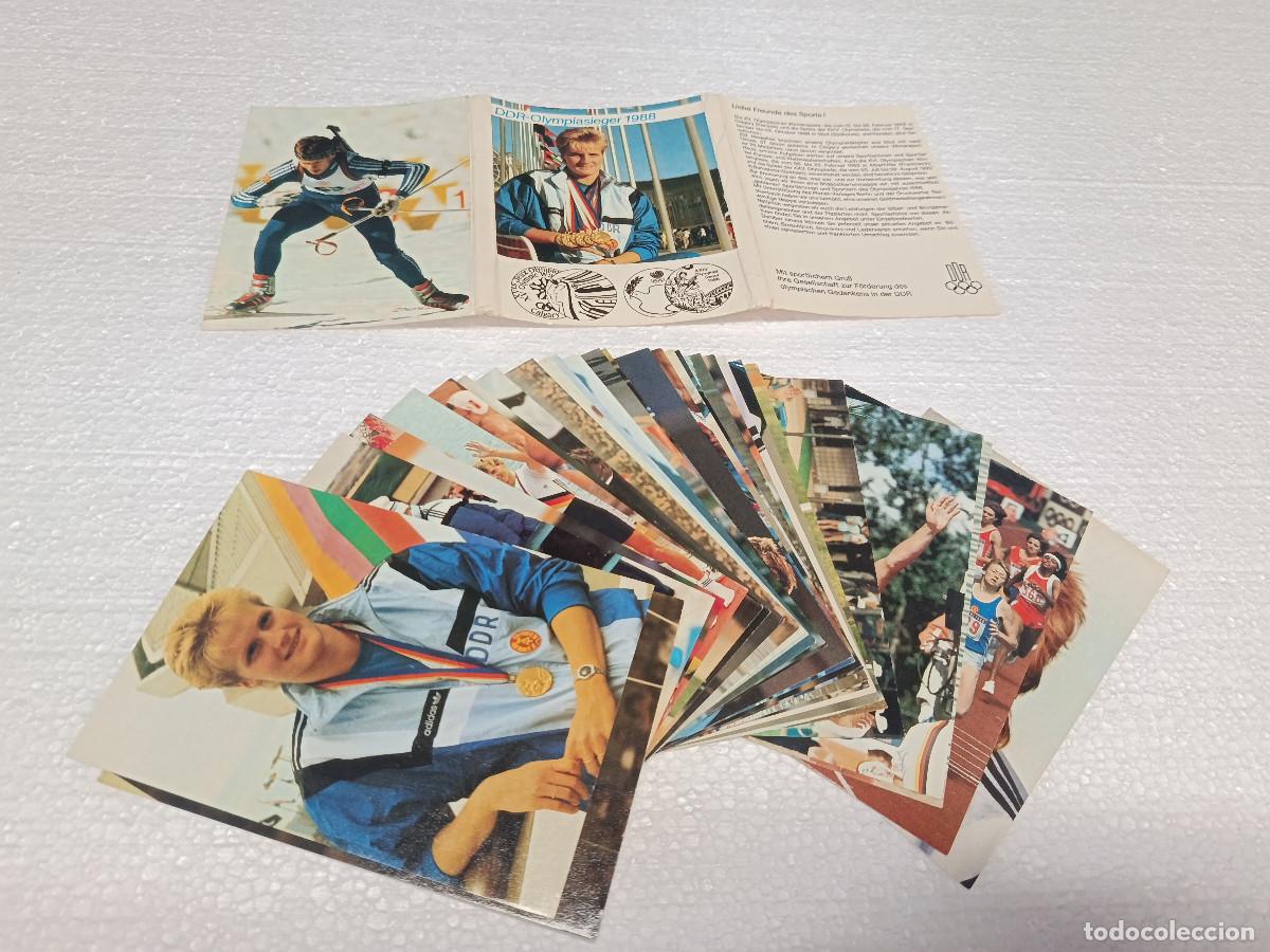 Coleccionismo deportivo: LOTE 28 POSTALES OLIMPICAS DDR 1988. ALEMANIA DEL ESTE. SIN CIRCULAR EN CARPETA ORIGINAL.