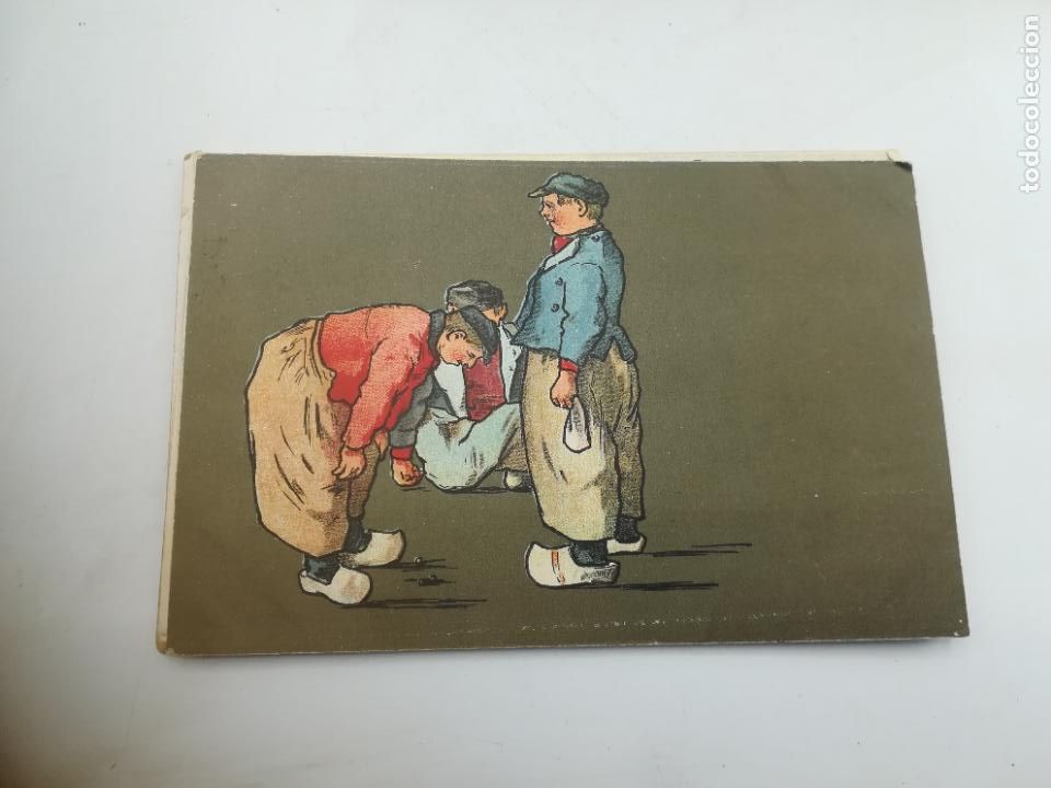 Postales: TARJETA POSTAL. CARICATURA. DIBUJO DE HOMBRES CON ZAPATOS HOLANDESES JUGANDO A LAS CANICAS.