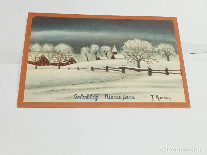 Cartoline: TARJETA POSTAL. DIBUJO DE PAISAJE NEVADO. CASAS ENCENDIDAS, ARBOLES.