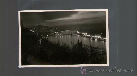 Postkarten: TARJETA POSTAL DE HUNGRIA. BUDAPEST. LATKEP ESTI VILAGITASBAN. MAGYAR.