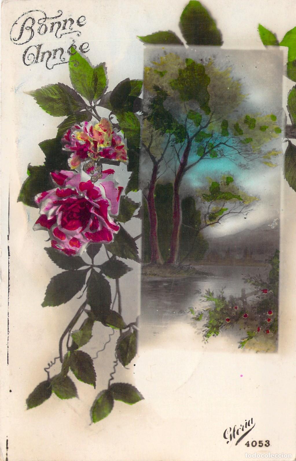 Postales: Postal de Felicitaci&oacute;n de A&ntilde;o Nuevo con Rosas y Paisaje