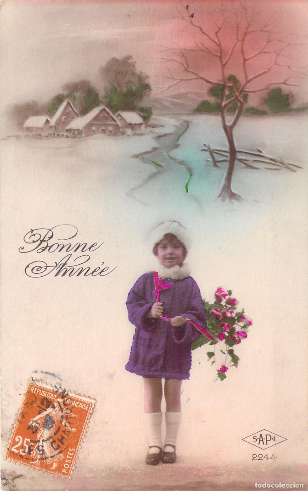 Postales: Postal de A&ntilde;o Nuevo Ni&ntilde;a con Flores en Paisaje Nevado