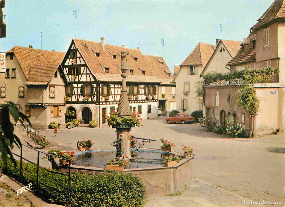 Cartes Postales: Francia - Carte Postale - 67 - Dambach-la-ville - Place du march&eacute; fontaine de l'ours et maison schae
