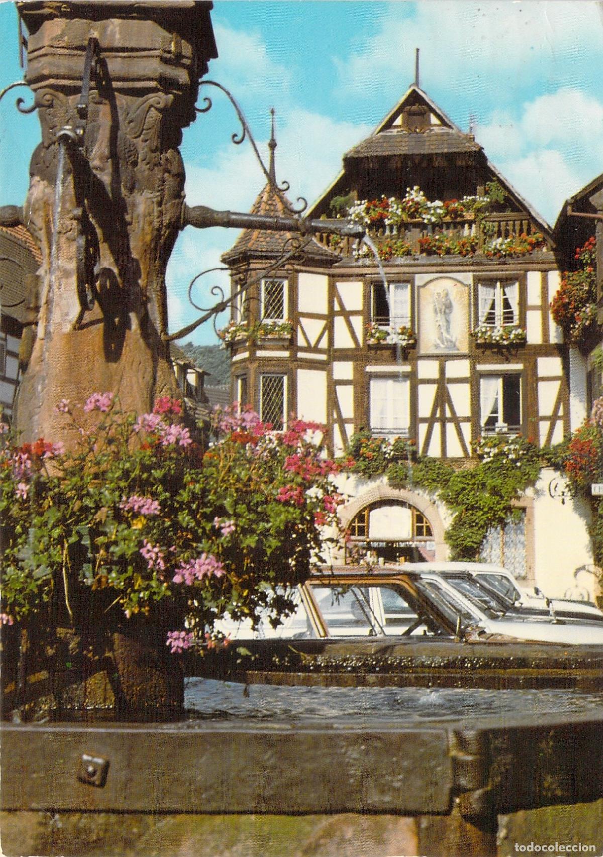 Postkarten: Postal de Kaysersberg, Alsacia: Casa de Entramado y Fuente de Flores