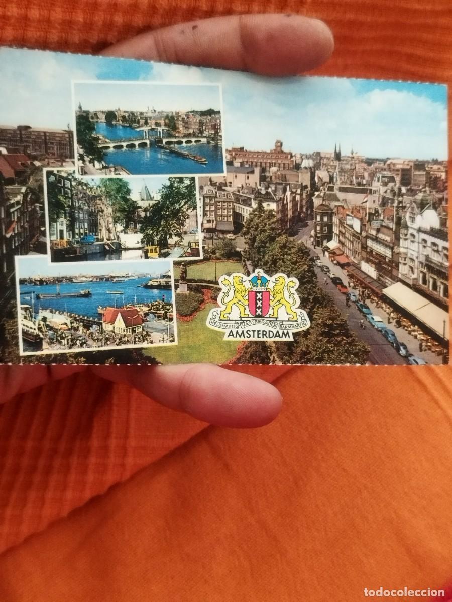 Postales: Tarjeta postal con m&uacute;ltiples vistas de Amsterdam en los Pa&iacute;ses Bajos.