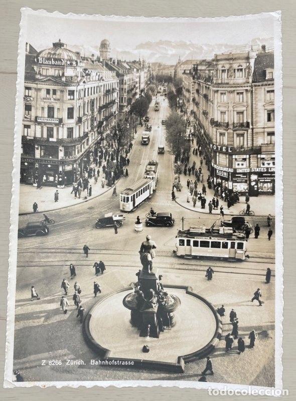 Postales: CPA Suiza Z&uuml;rich - Bahnhofstrasse - Vista con Tranv&iacute;as, Coches de &Eacute;poca y Monumento - Dos Caras
