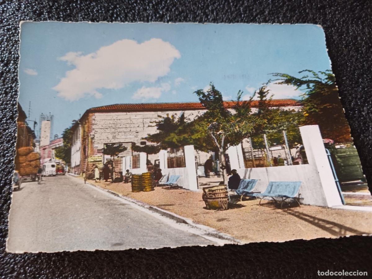 Postales: millas, route nationale, le marche