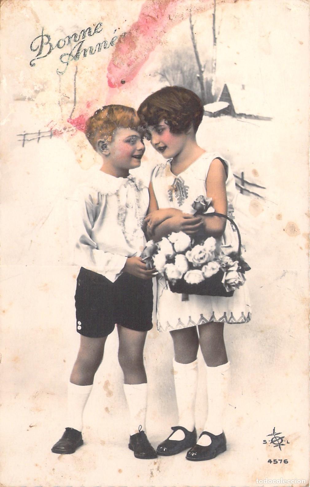 Postales: Postal de A&ntilde;o Nuevo con ni&ntilde;os y flores