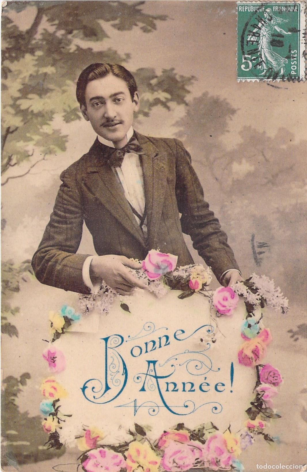 Postales: Postal de Feliz A&ntilde;o Nuevo con hombre y flores