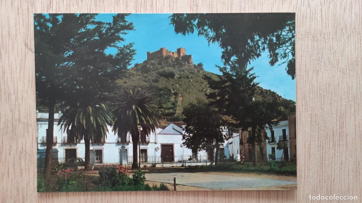 Postales: POSTAL BURGUILLOS DEL CERRO BADAJOZ PARQUE CARRERO BLANCO ANTES FUENTE LLANO AL FONDO EL CASTILLO