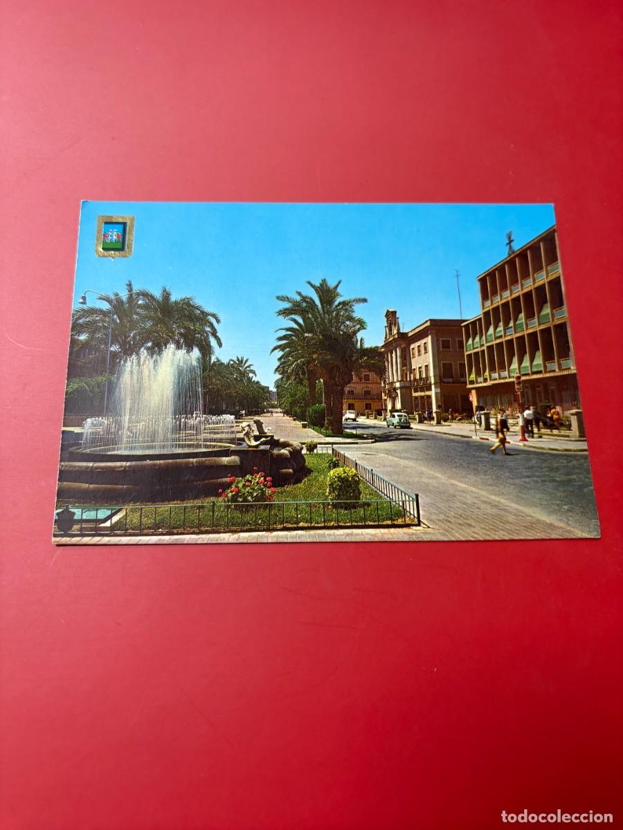 Postales: TARJETA POSTAL. BADAJOZ. N&ordm; 6.- AVENIDA DEL GENERAL VARELA. ESCUDO DE ORO