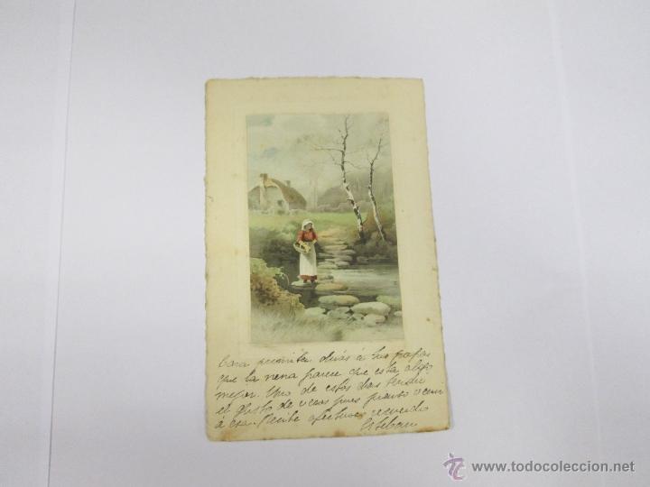 Cartoline: MUJER CRUZANDO RIO - 1909 - CON SELLO - CIRCULADA