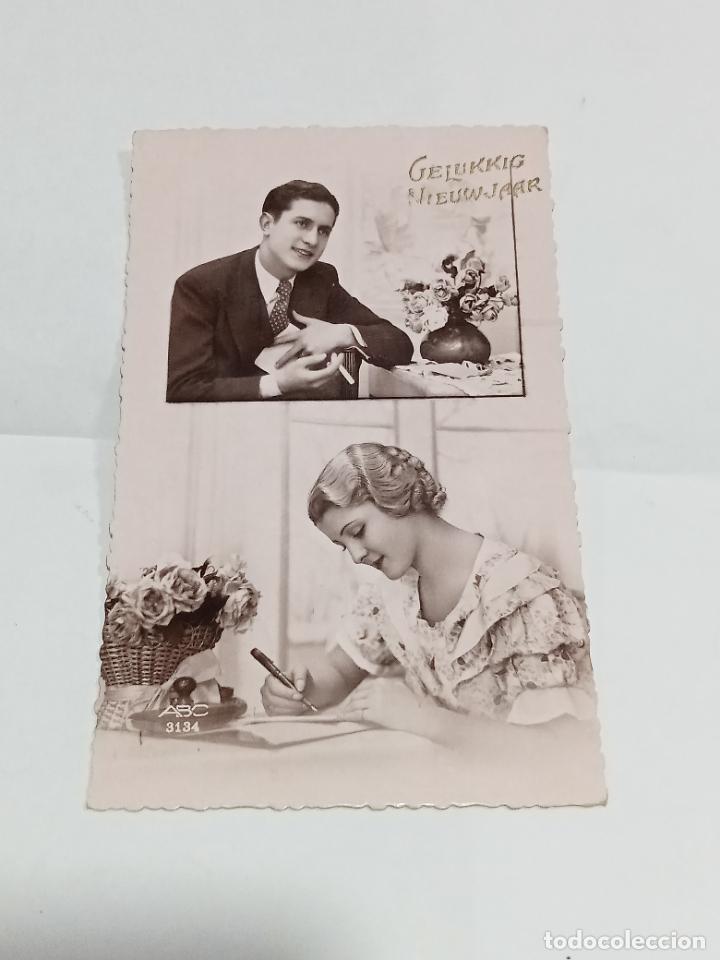 Cartoline: TARJETA POSTAL. PAREJA DE ENAMORADOS ESCRIBI&Eacute;NDOSE UNA CARTA