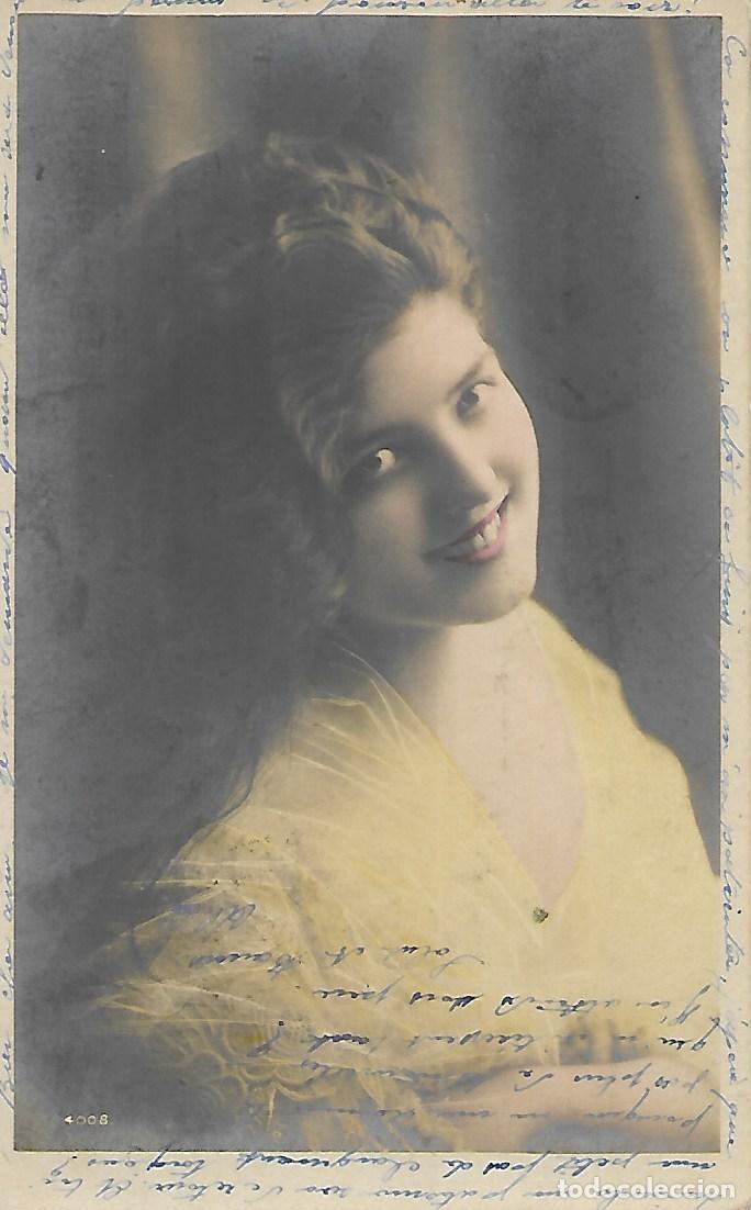 Postkarten: ANTIGUA POSTAL-DAMA SONRIENDO (Circulada en 1904)