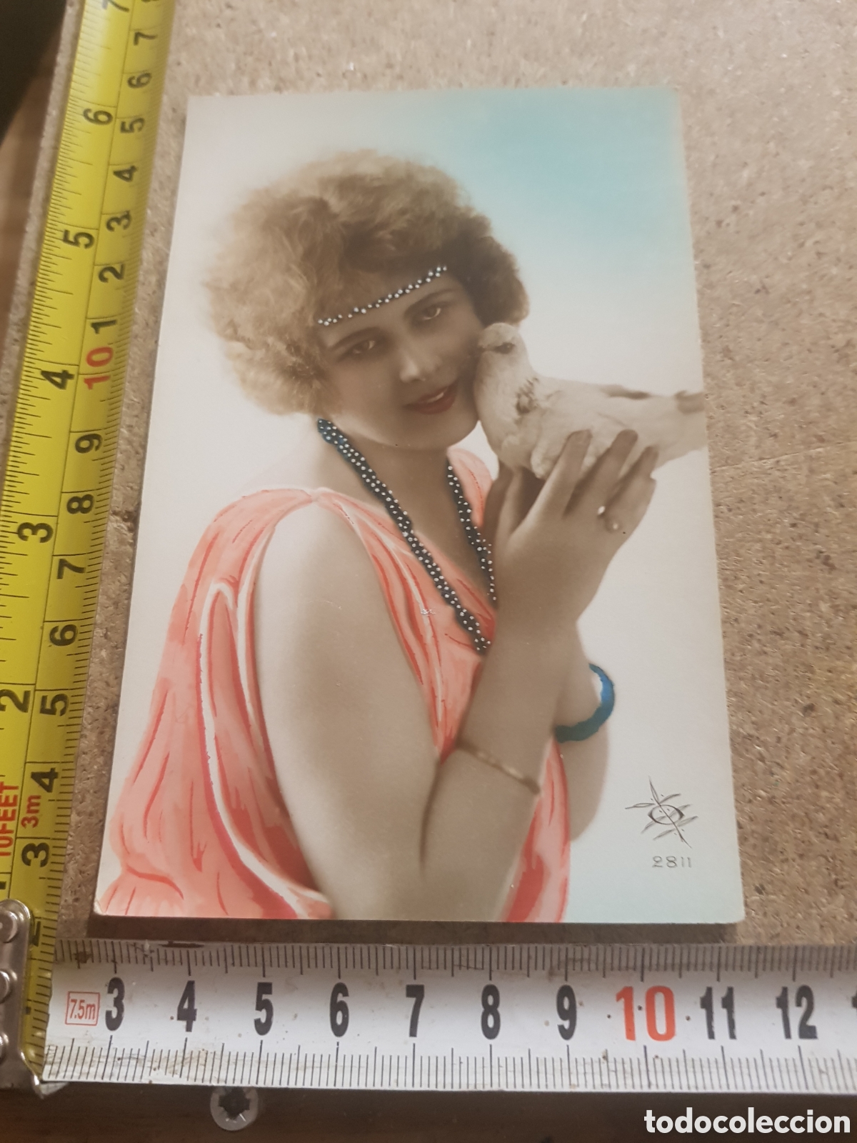 Postais: Postal de una chica con una paloma, a&ntilde;os 20 aprox.