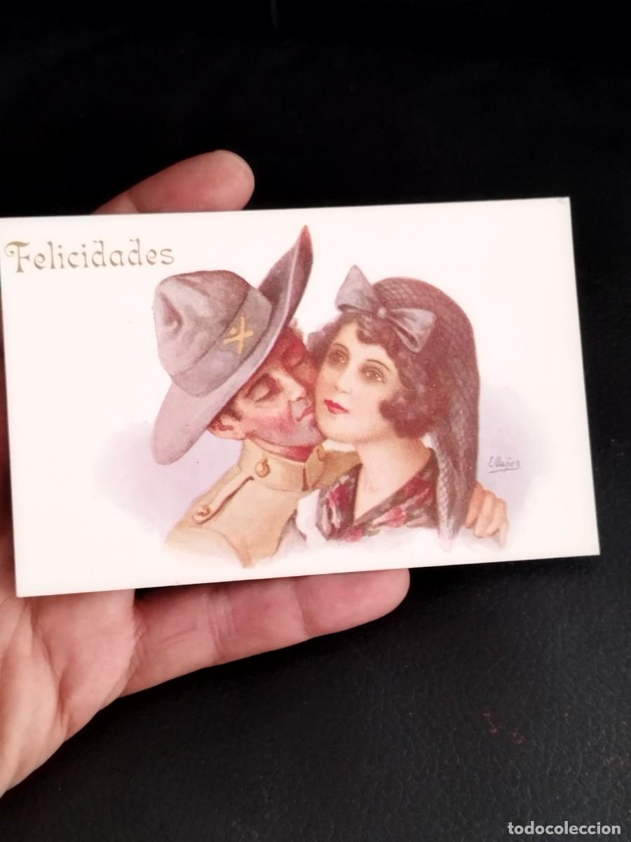 Postales: Antigua tarjeta postal felicitaci&oacute;n que presenta una ilustraci&oacute;n de una pareja abrazada, L. Iba&ntilde;ez.