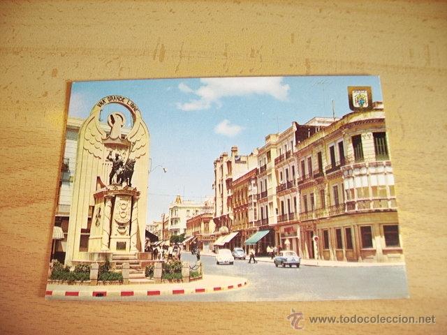 Postales: MELILLA   -- MONUMENTOY AVENIDA DEL GENERALISIMO  -- - Foto 1