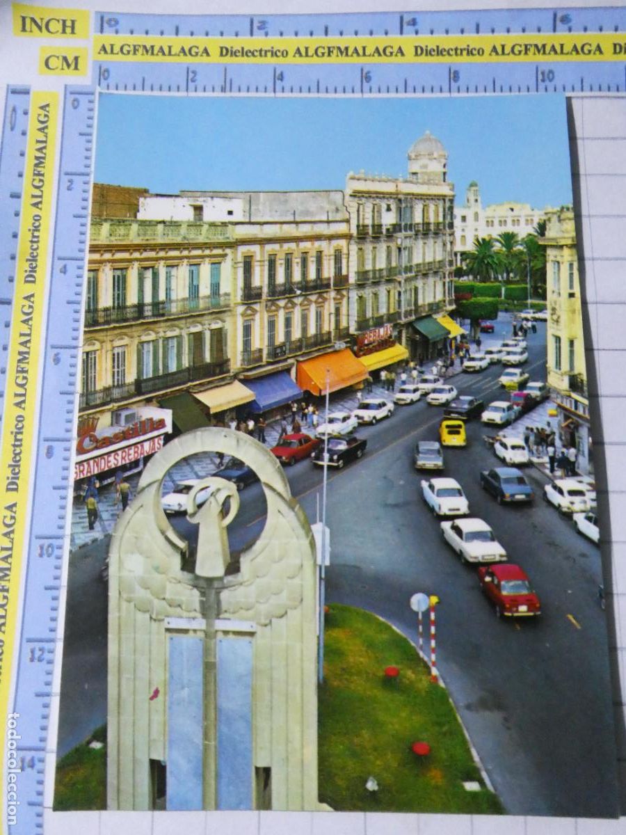 Postales: POSTAL DE MELILLA. A&Ntilde;O 1975. PLAZA H&Eacute;ROES DE ESPA&Ntilde;A Y AVENIDA GENERAL&Iacute;SIMO COCHES. 15 MONTERO. 3734