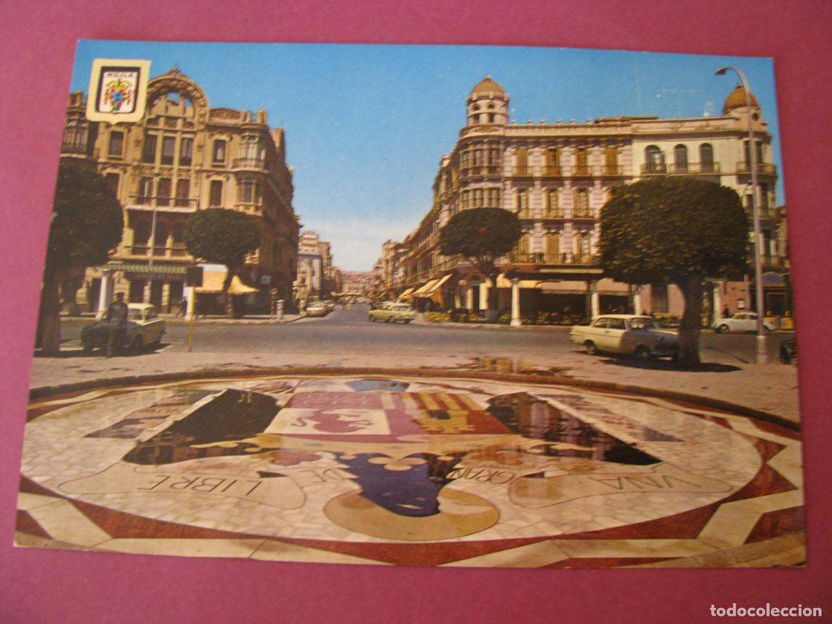 Postales: POSTAL DE MELILLA. PLAZA DE ESPA&Ntilde;A. AVENIDA DEL GENERALISIMO. ESCUDO DE ORO. 56