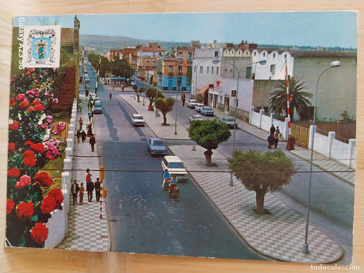 Postales: MELILLA BARRIO REAL ENTRADA NUEVA ED MONTERO 1374 ESCRITA A&Ntilde;O 1973 COCHES CLASICOS ANIMADA
