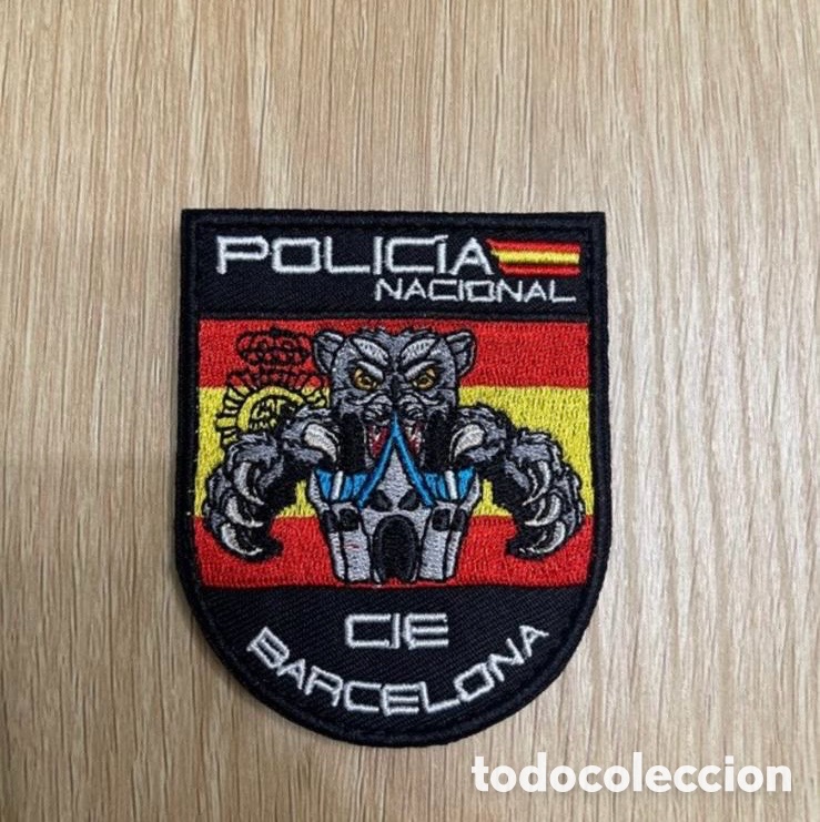 Postales: Parche polic&iacute;a CIE Bcn