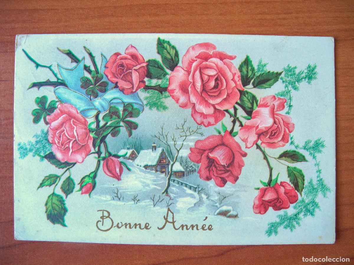 Postales: Postal Navidad. Flores rosas paisaje nevado contornos dorados 14x9. Circulada con sello