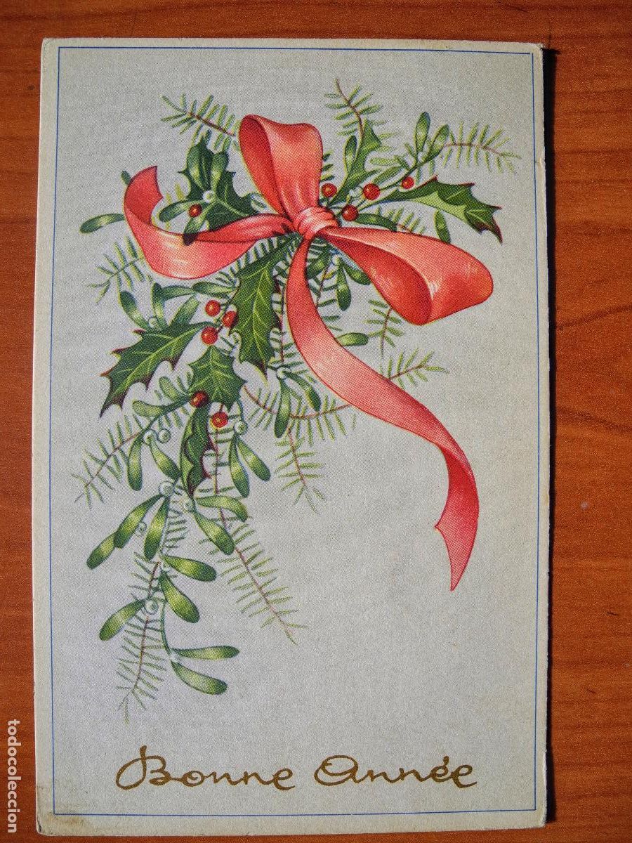 Postais: Feliz a&ntilde;o nuevo. Mu&eacute;rdago. Lazo. Acebo. Circulada con sello 9x14.